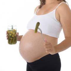 pregnancy woman eating pickles