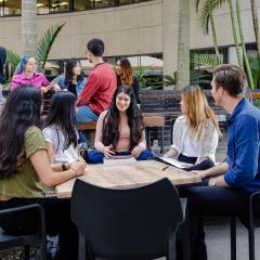 Students socialising in the Chamberlain Building Courtyard